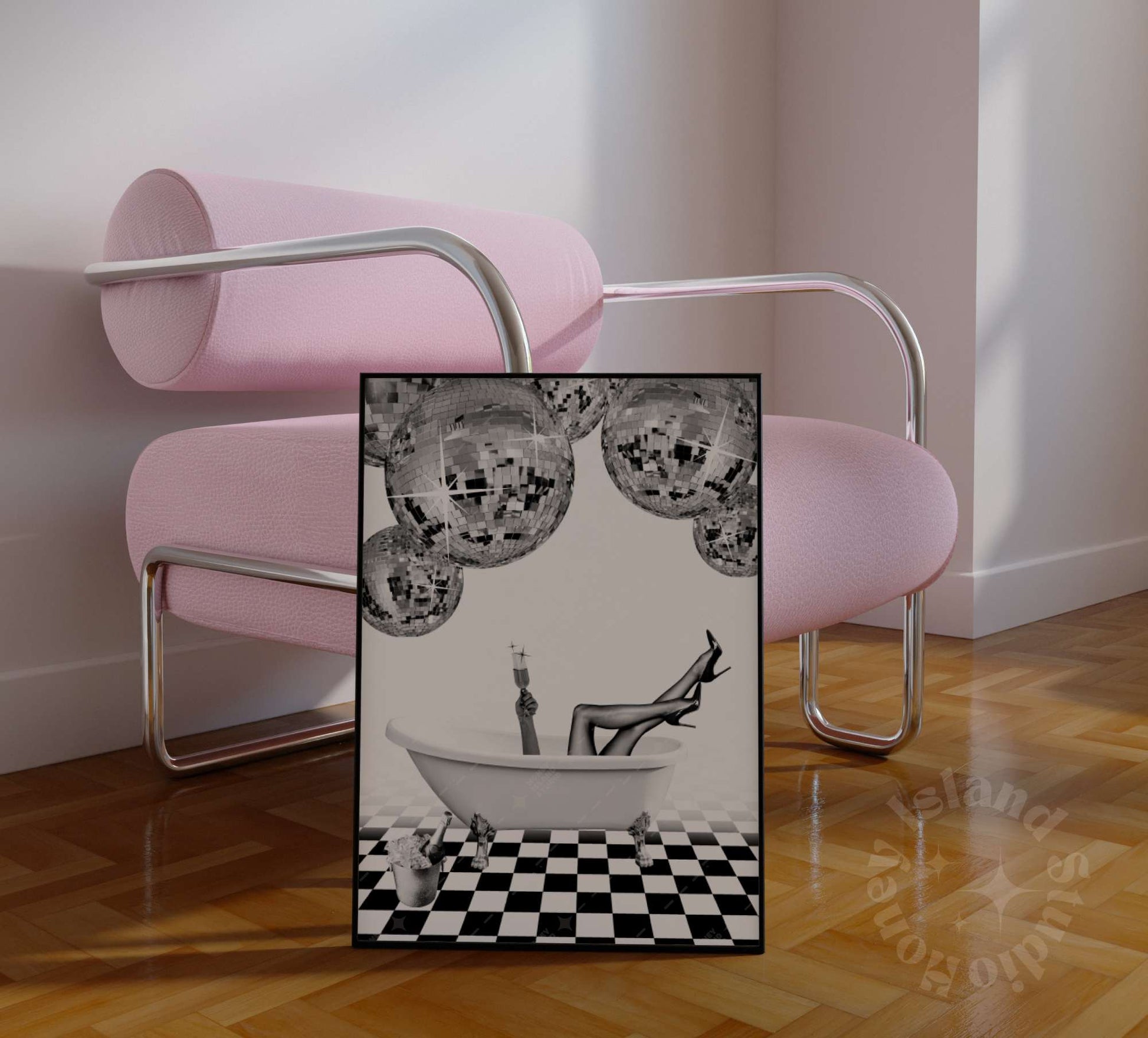 a framed black white poster whosing disco balls champagne and  bathtub styles against a pink chair