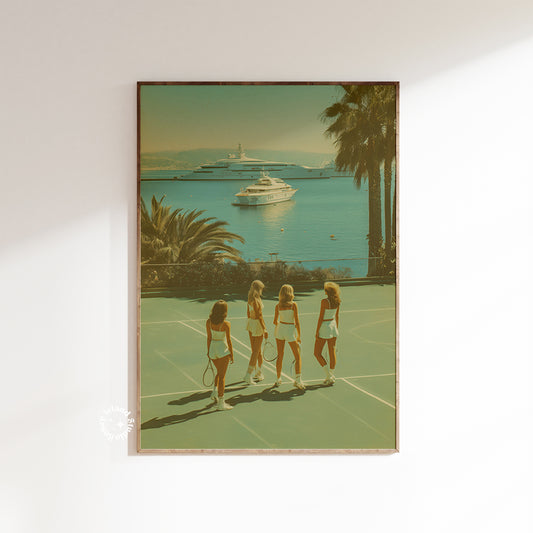 Framed artwork of four women on a tennis court with a scenic background