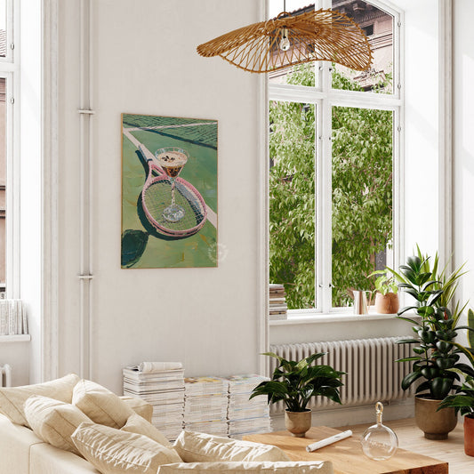 Living room with a couch, coffee table, and tennis wall art