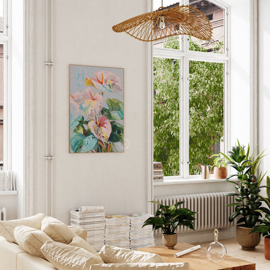 Living room with a floral painting, plants, and a large window.
