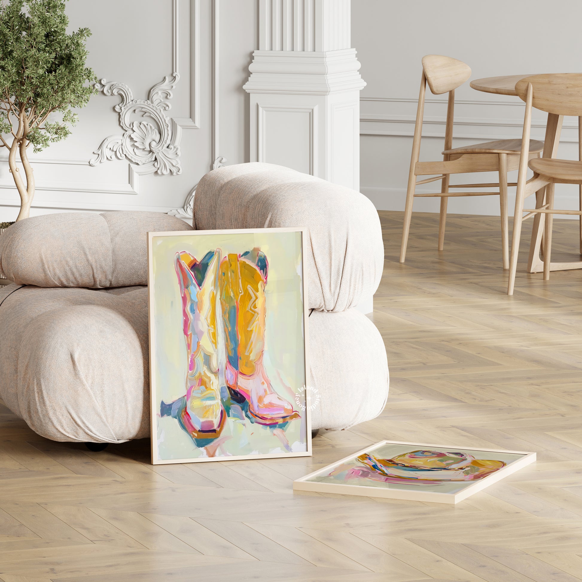 Colorful Cowgirl boots art on a wooden floor with a white wall and decorative elements.
