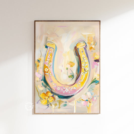 Colorful artwork of a horseshoe with floral elements on a white wall.