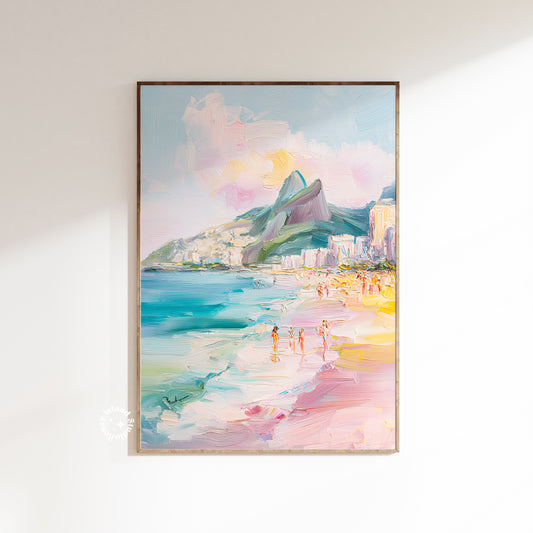 Framed artwork of a beach scene with mountains and people, on a white wall.