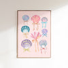 Framed artwork with colorful shell designs on a pink background