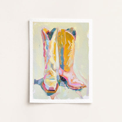 Colorful abstract painting of cowboy boots on a light background