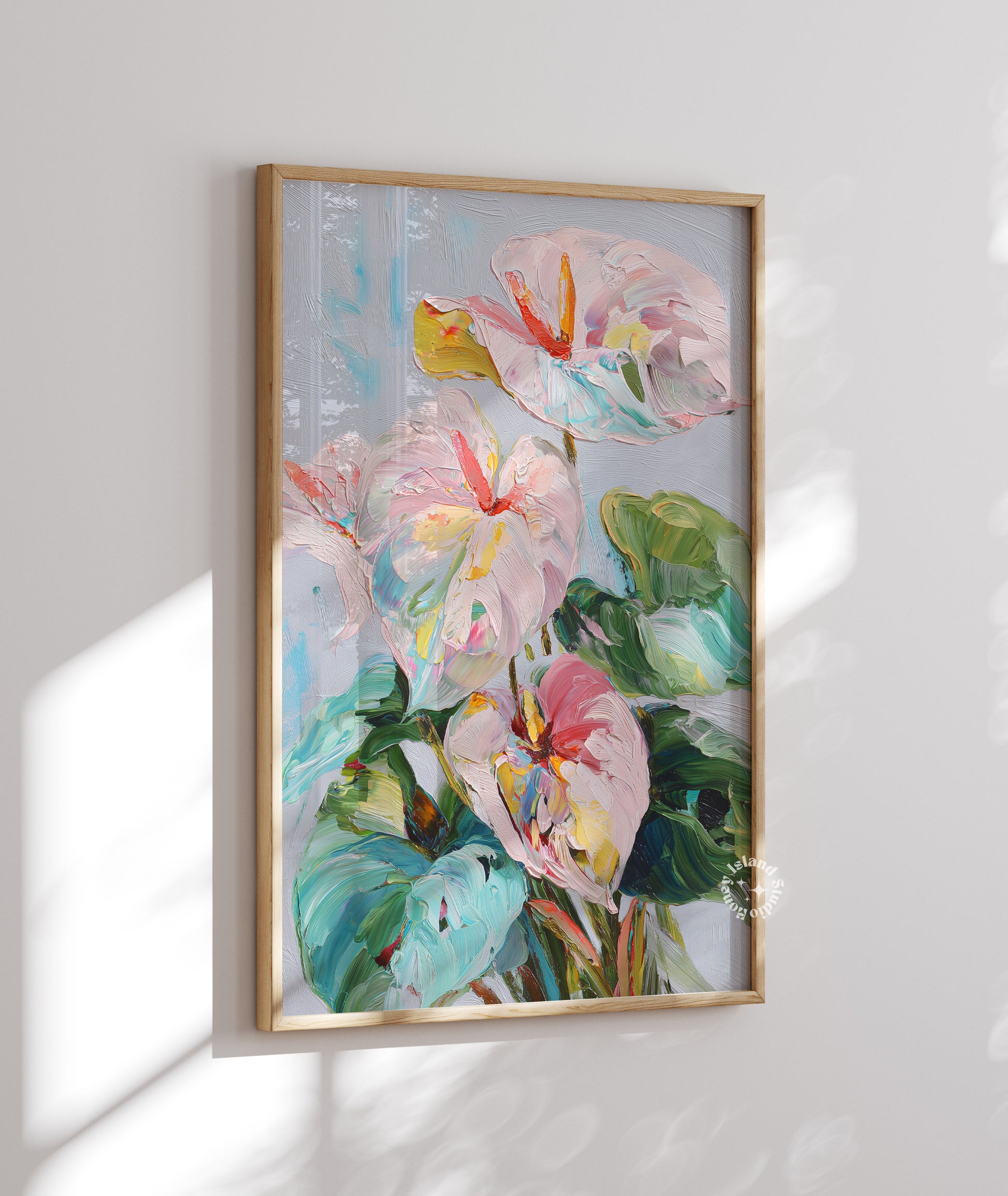 Framed floral painting on a white wall