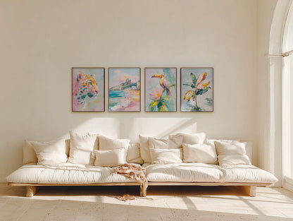 White sofa with decorative pillows in a room with colorful abstract paintings on the wall.