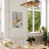 Living room with a couch, coffee table, and decorative items.