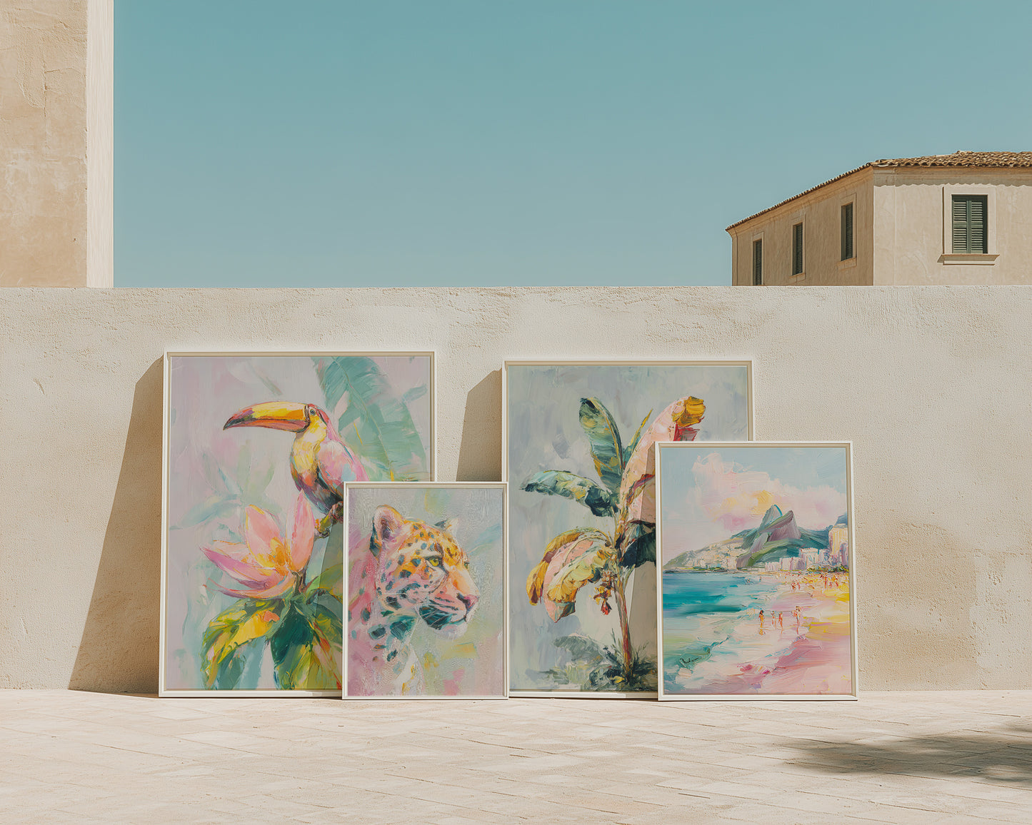 Set of four colorful tropical-themed paintings on a wall.