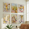 Set of six colorful wall art pieces featuring horses and desert scenes on a light-colored wall. western wall print, western wall decor, cowgirl collection print.
