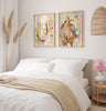Bedroom with a bed, decorative pillows, and wall art featuring a horse and horseshoe painting wall art.