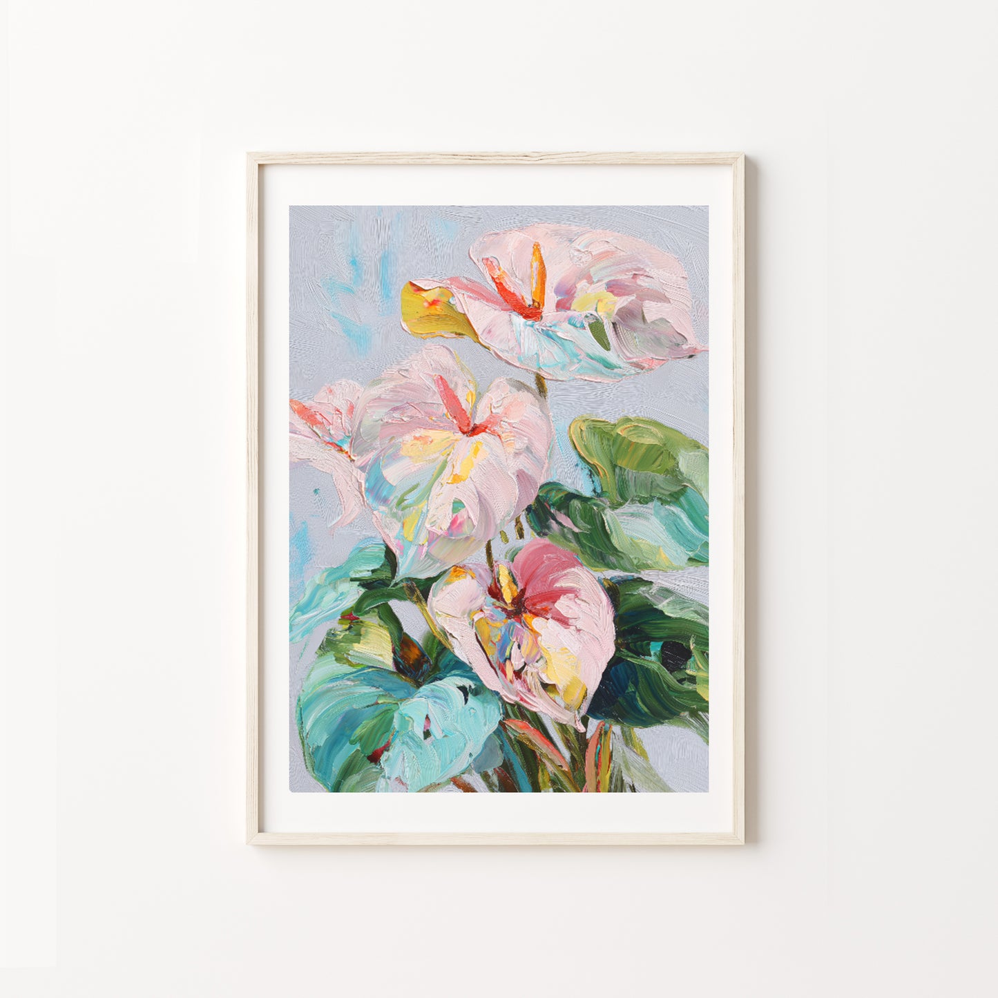 Framed artwork of colorful flowers on a white wall