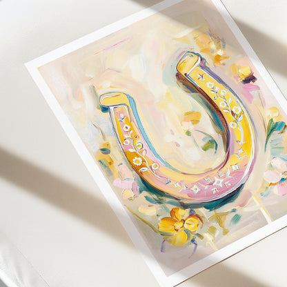 Colorful illustration of a horseshoe with floral elements on a white background