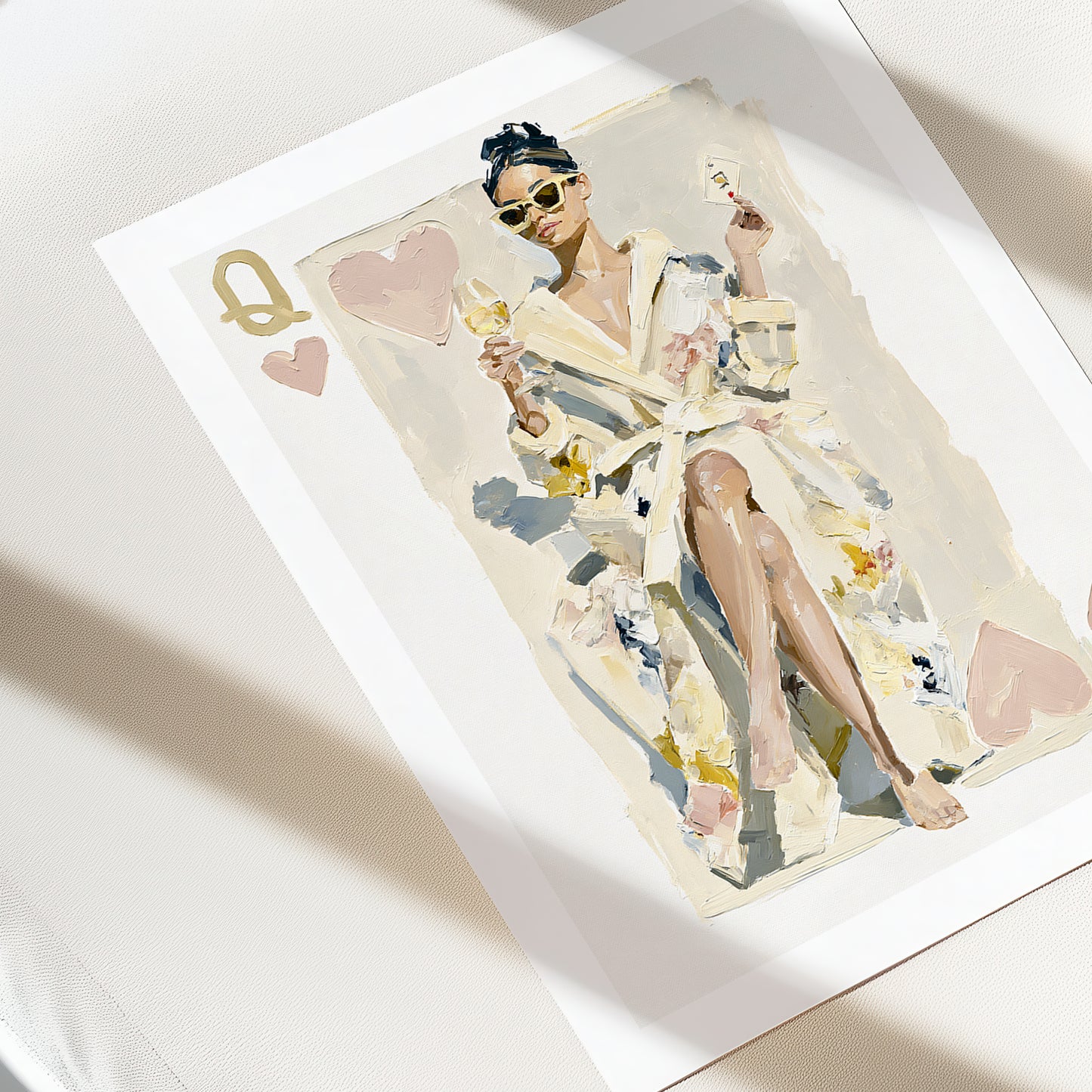 Illustration of a queen of hearts in a robe with playing card symbols on a white surface
