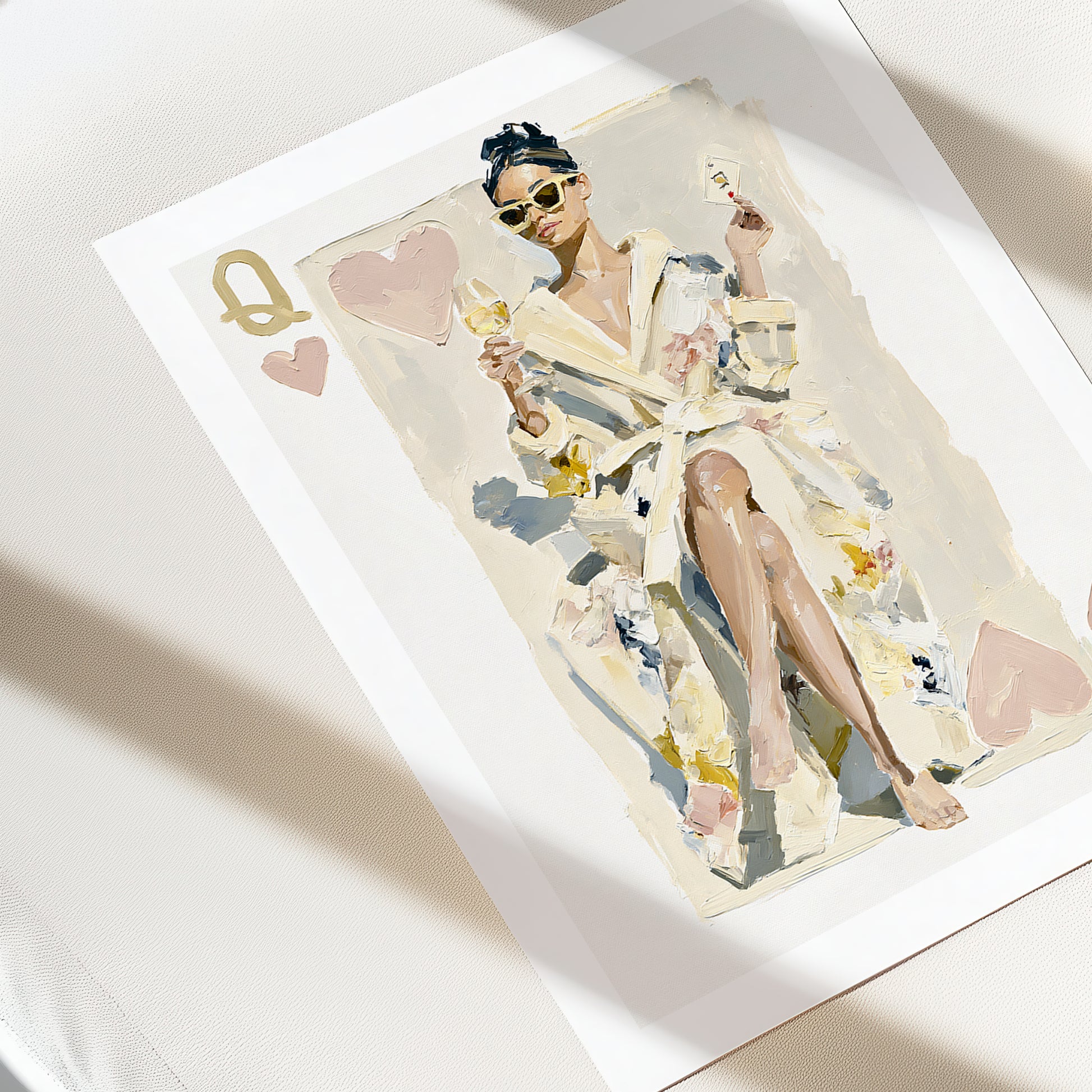 Illustration of a queen of hearts in a robe with playing card symbols on a white surface