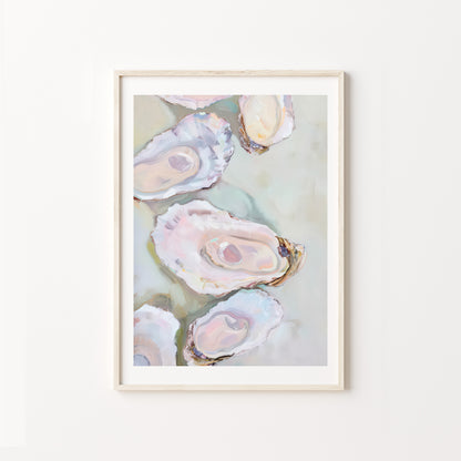 Framed artwork of oyster shells on a light background