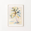 Framed artwork of a palm tree with abstract design on a white wall