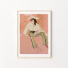 Framed artwork of a western woman cowgirl sitting on a pink background