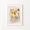Framed artwork of colorful horses on a white wall
