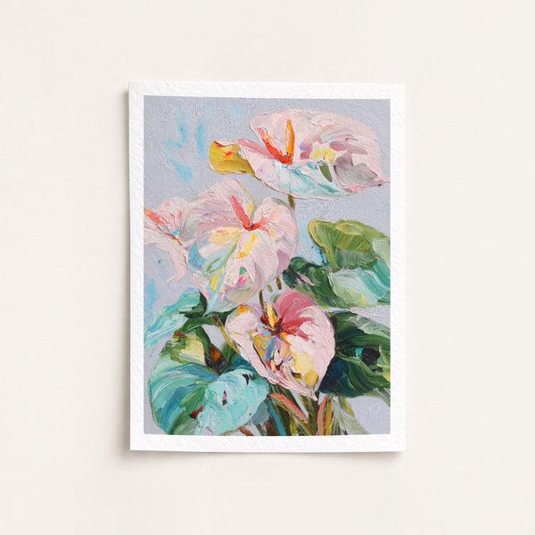 Framed artwork of colorful flowers on a light gray background