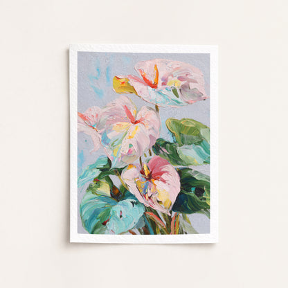 Framed artwork of colorful flowers on a light gray background