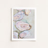 Framed artwork of oyster shells on a light background