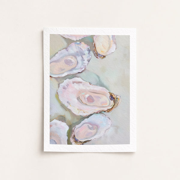 Framed artwork of oyster shells on a light background