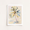 Framed artwork of a palm tree with abstract design on a light background