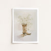 Framed artwork of a cowboy boot with flowers on a light background