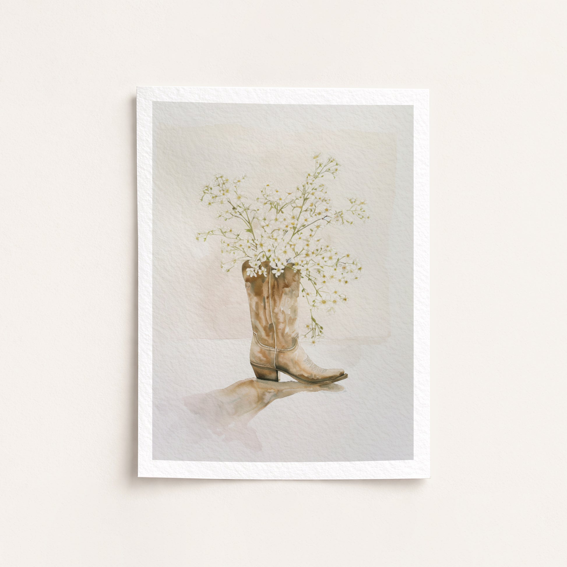 Framed artwork of a cowboy boot with flowers on a light background