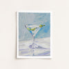 Artistic depiction of a martini glass with olives on a textured blue and white background