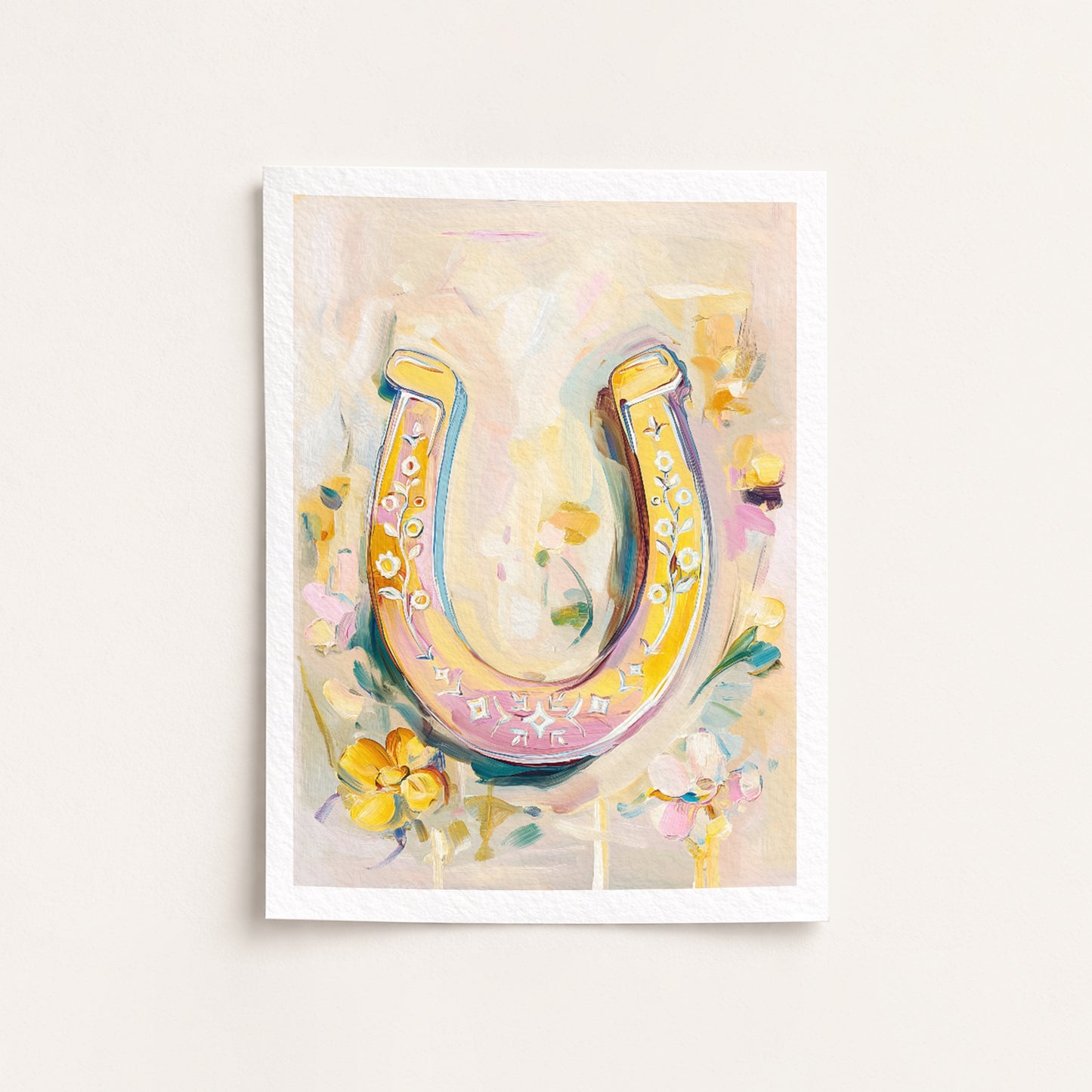 Framed artwork of a colorful horseshoe with flowers on a light background