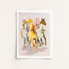 Framed artwork of colorful horses on a light background