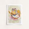 Framed abstract art print with colorful brush strokes on a light background