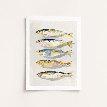 Framed artwork of four stylized fish illustrations on a light background