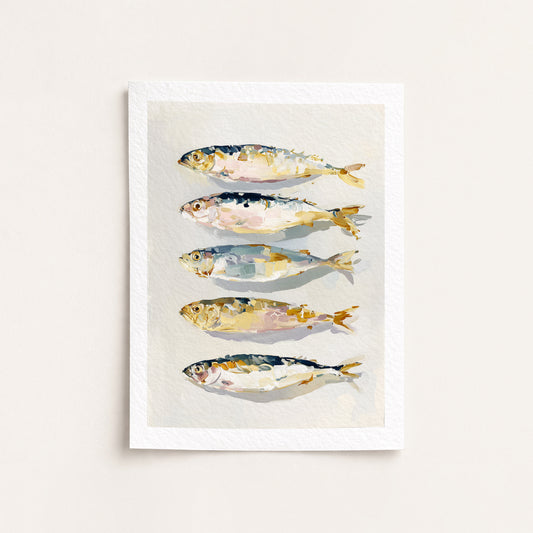 Framed artwork of four stylized fish illustrations on a light background