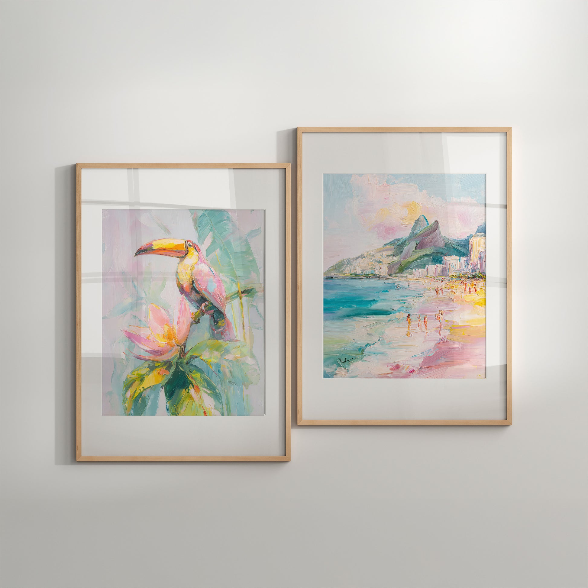 Two framed artworks on a wall, one with a tropical scene and the other with a beach view.