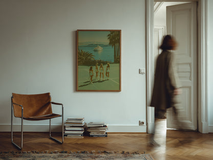Brown leather chair and stack of books in a room with a painting on the wall.