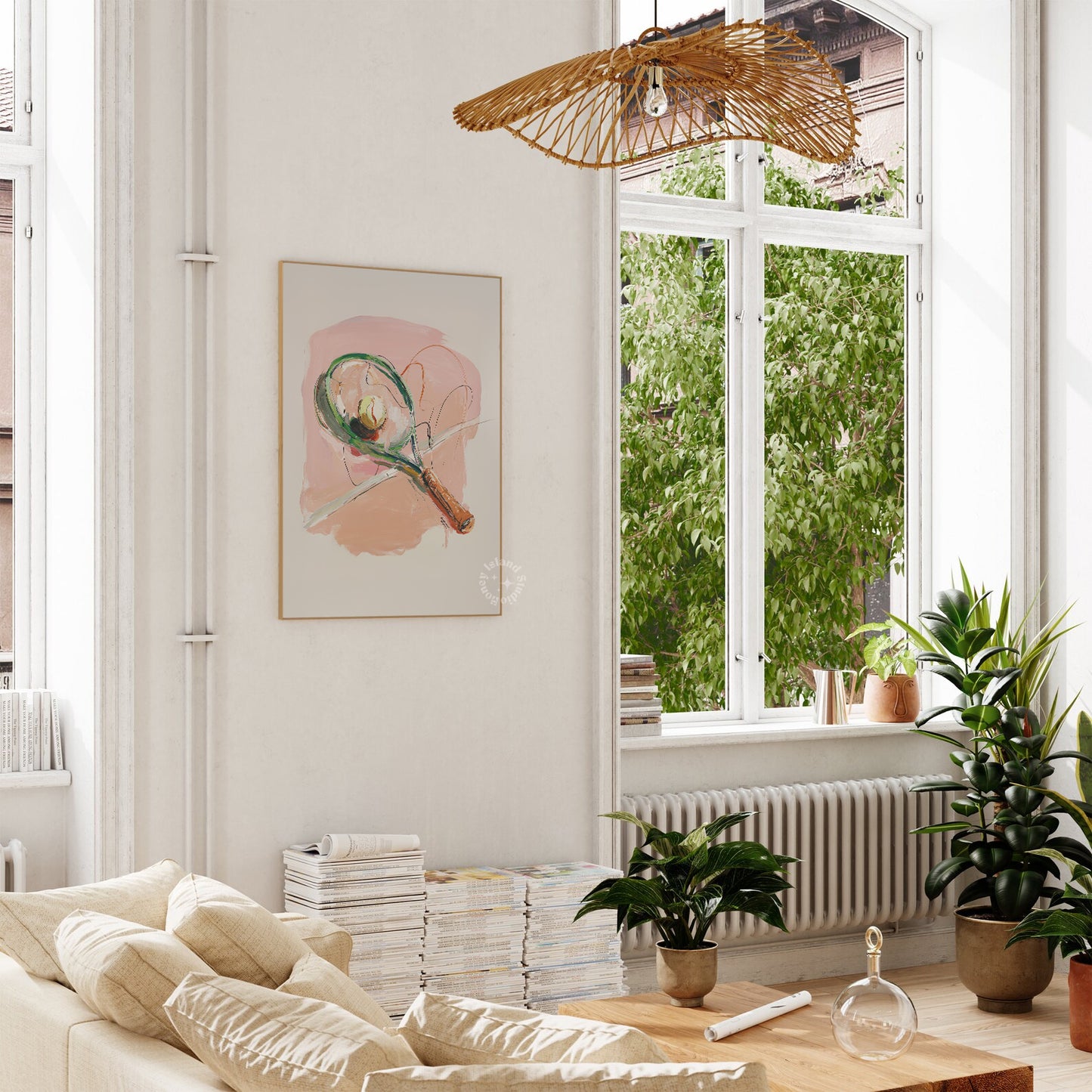 Living room with a couch, coffee table, and large window with plants