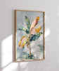 Framed artwork of a floral design on a white wall