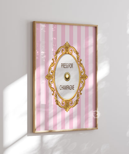 Decorative wall art with pink striped background and gold frame on a white wall.